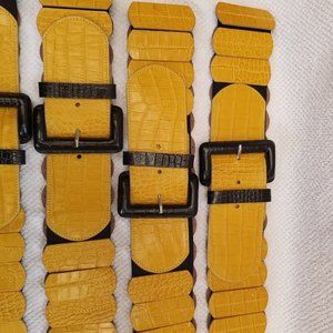 Yellow embossed leather expandable belt.